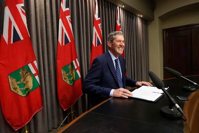 Manitoba Premier Brian Pallister speaks to media at a conference before the provincial throne speech.