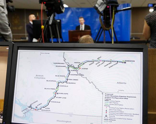 A map of the Kinder Morgan Trans Mountain pipeline is seen in the foreground of this file photo.