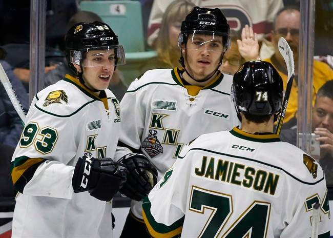 London Knights' Mitchell Marner, left, celebrates his goal with teammates Matthew Tkachuk, centre, and Aiden Jamieson during second period CHL Memorial Cup hockey action against the Red Deer Rebels in Red Deer, Friday, May 20, 2016.