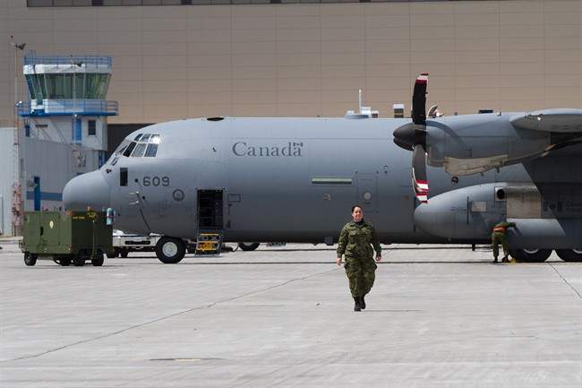 Several CC-130J Hercules transport aircraft sit on the tarmac at CFB Trenton in Trenton, Ont., on Wednesday, May 4, 2016. Russia is conducting a s