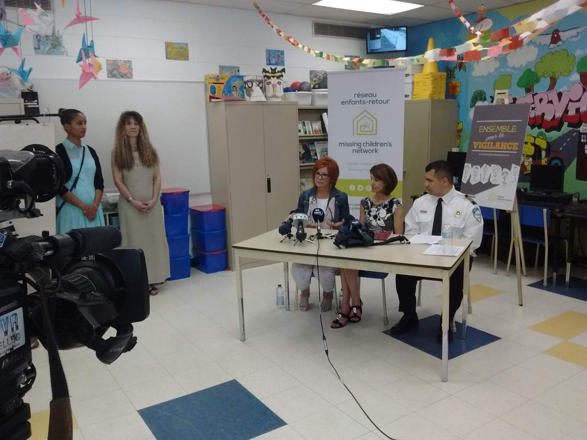 The Missing Children’s Network speaks to students at École Barthelemy Vimont Wednesday, May 25, 2016. Caroline Lachance, mother of David Fortin, is seated left.