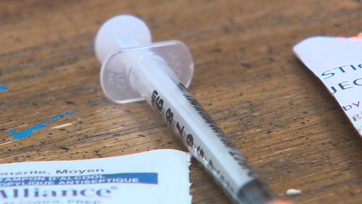 Winnipeg cop poked by blood-filled syringe in back-alley urination arrest - image