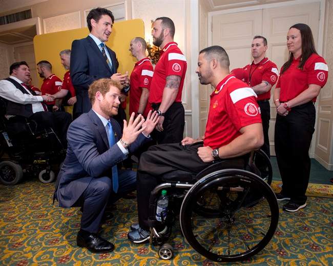Prince Harry, left, meets with Canadian athletes alongside Prime Minister Justin Trudeau during the Prince’s visit to Toronto to promote the 2017 Invictus Games.