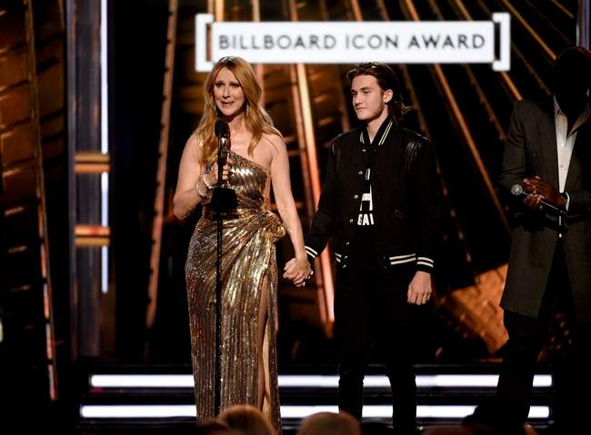 Rene-Charles Angelil presents the Icon Award to his mother, Celine Dion, at the Billboard Music Awards at the T-Mobile Arena on Sunday, May 22, 2016, in Las Vegas.
