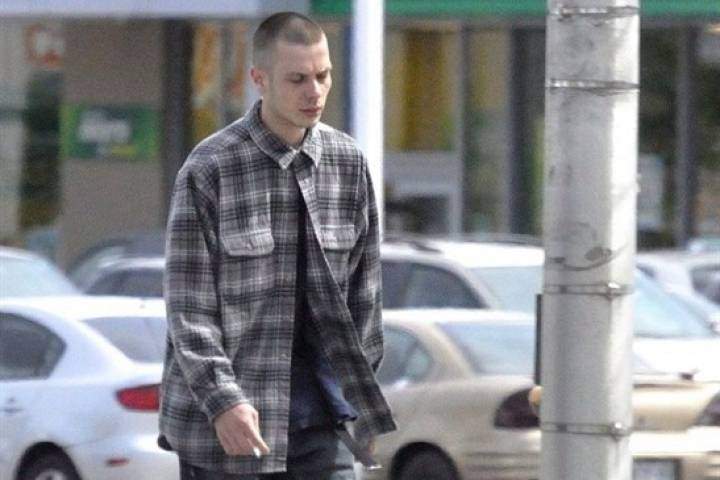 Mark Smich is shown in a police surveillance photo released as a court exhibit at the Tim Bosma murder trial. 
