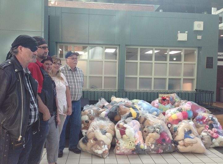 Members of the Southern Alberta Bikers Association drop off stuffed animals at the Chinook Regional Hospital. 