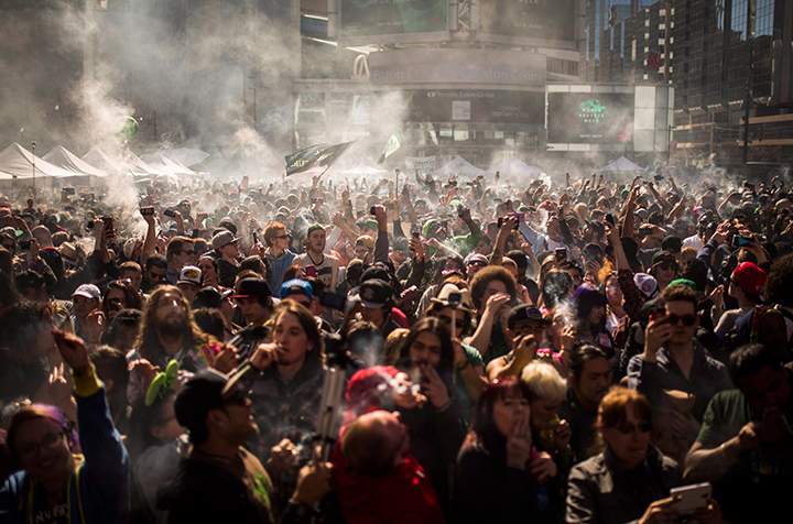 Thousands of people gather to smoke marijuana during the “420 Toronto” rally in Toronto, Wednesday April 20, 2016.