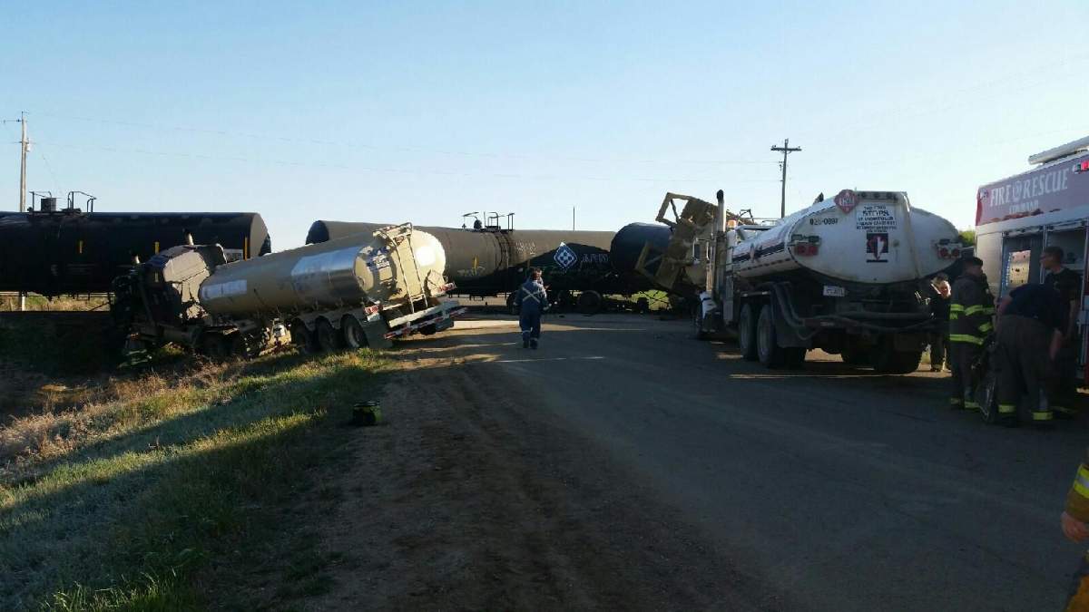A train is derailed near Vermilion, Alberta after it collides with a fluid hauler truck, Friday, May 13, 2016.