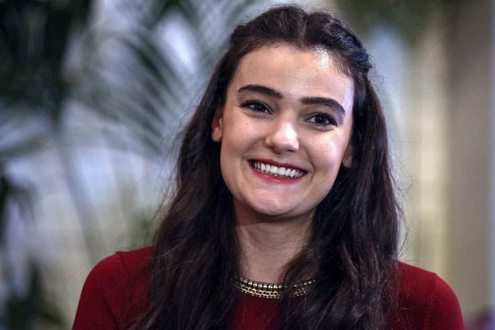 In this Thursday, Feb. 26, 2015 file photo, former Miss Turkey Merve Buyuksarac speaks to The Associated Press in Istanbul, Turkey.
