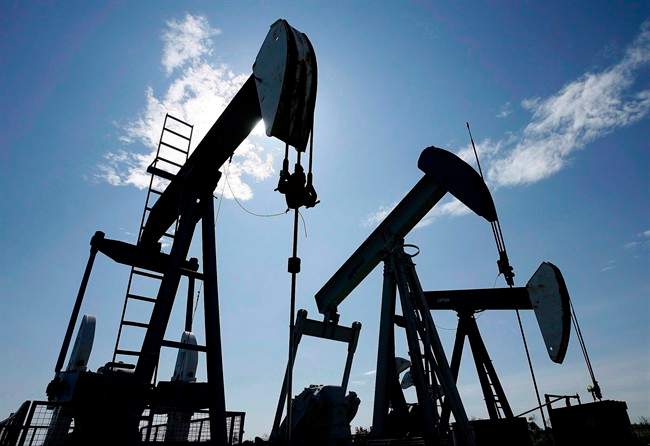 Pumpjacks pump crude oil near Halkirk, Alta., June 20, 2007.