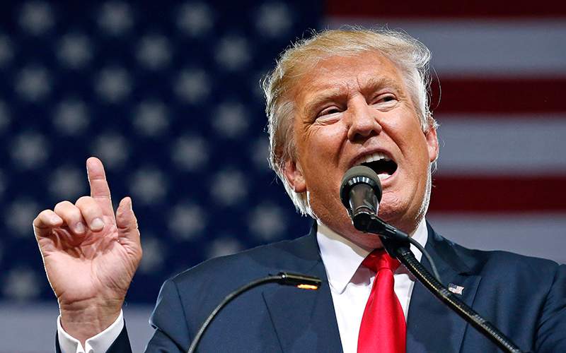 Republican presidential candidate Donald Trump speaks at a rally Saturday, June 18, 2016, in Phoenix.