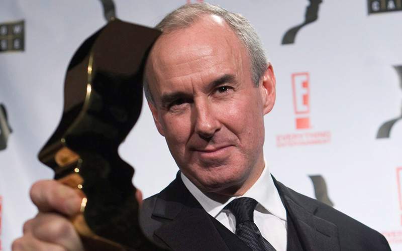 Ron McLean poses for a photograph after winning the Best Host Interviewer in a Sports Program or Sportscast, for Hockey Night in Canada, during the 23rd Annual Gemini Awards in Toronto on Friday, November 28, 2008. 