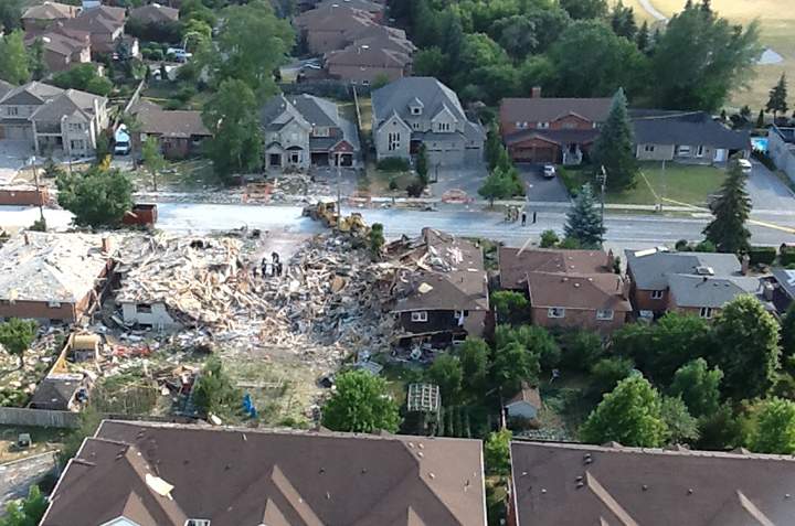Investigators recover the body of a man from the rubble of a house explosion in Mississauga on June 30, 2016. Bob Kopij/Handout