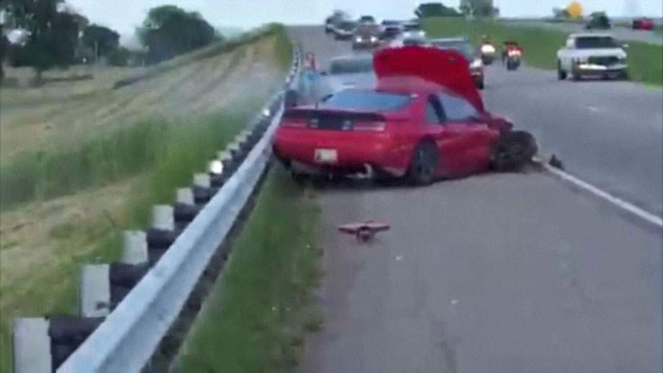Caught on camera: Oklahoma road rage incident ends with car swerving into other lanes, crashing into guardrail - image