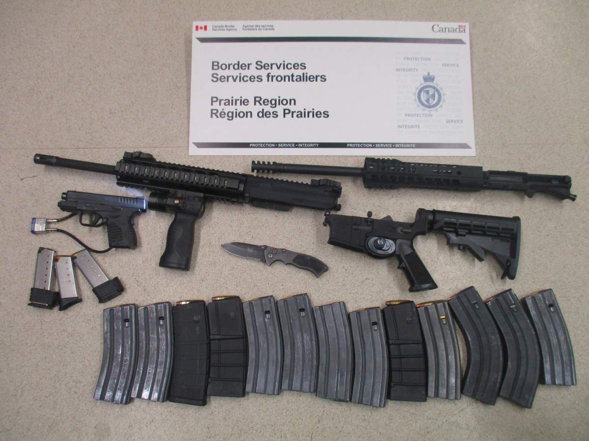 On May 26 CBSA officers found a undeclared .45 calibre pistol, 13 overcapacity magazines, a prohibited switchblade, and a prohibited AM-15 semi-automatic assault rifle.