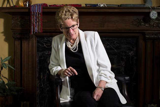 Ontario Premier Kathleen Wynne is photographed in her office in the Queens Park Legislature in Toronto on Thursday, June 9, 2016.