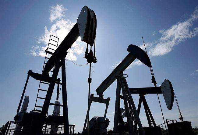 Pumpjacks pump crude oil near Halkirk, Alta., June 20, 2007 .