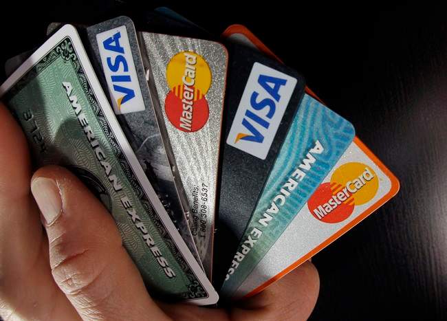 Consumer credit cards are posed in North Andover, Mass.
