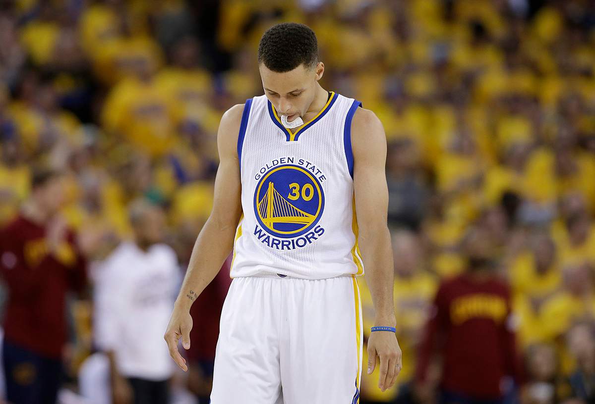 Golden State Warriors guard Stephen Curry (30) walks on the floor during the second half of Game 5 of basketball’s NBA Finals against the Cleveland Cavaliers in Oakland, Calif., Monday, June 13, 2016.