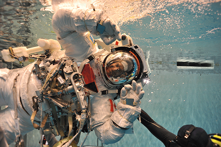 Astronaut David Saint-Jacques takes his first dive at NASA’s Neutral Buoyancy Laboratory in Houston, Texas, as part of his spacewalk training.