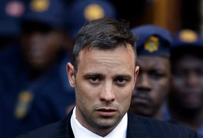 Oscar Pistorius leaves the High Court in Pretoria, South Africa, Wednesday, June 15, 2016, after his sentencing proceedings.