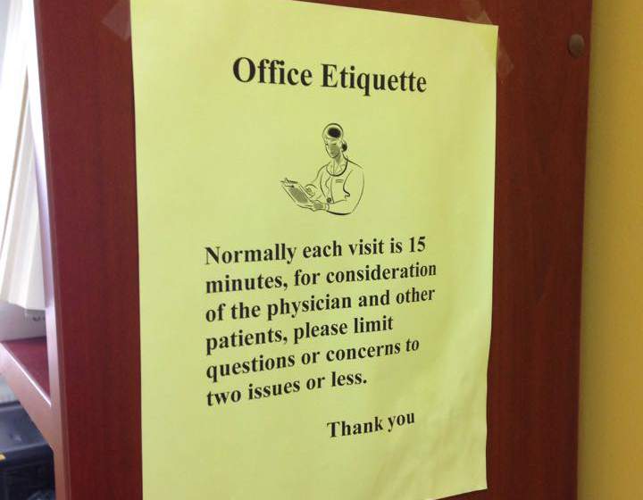 A note on a physician’s door in Toronto recommends patients only see their doctors for 15 minutes and limit their questions to two issues or less.