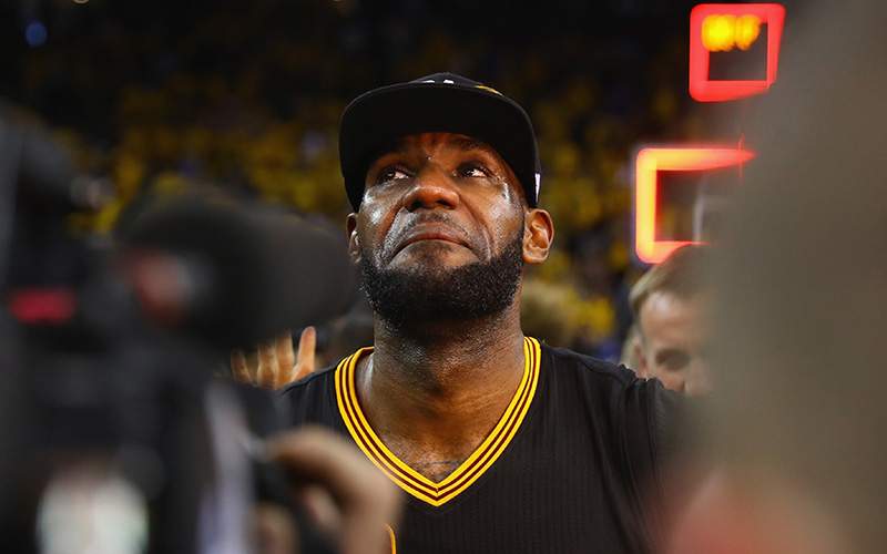 LeBron James of the Cleveland Cavaliers reacts after defeating the Golden State Warriors 93-89 in Game 7 of the 2016 NBA Finals at ORACLE Arena on June 19, 2016 in Oakland, California.