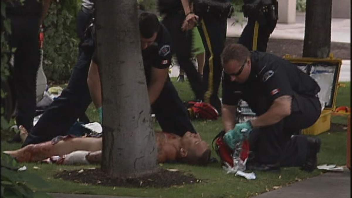 Paramedics treat Hells Angel Larry Amero.