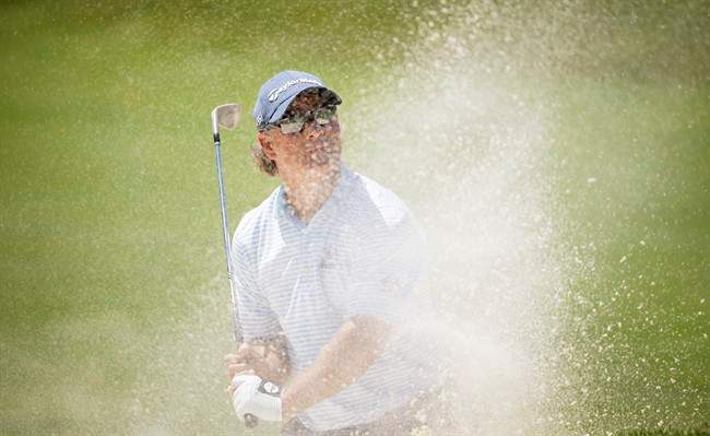 Scott McCarron hits out of a bunker onto the ninth green during the final round of the PGA Tour Champions Principal Charity Classic golf tournament, Sunday, June 5, 2016,.