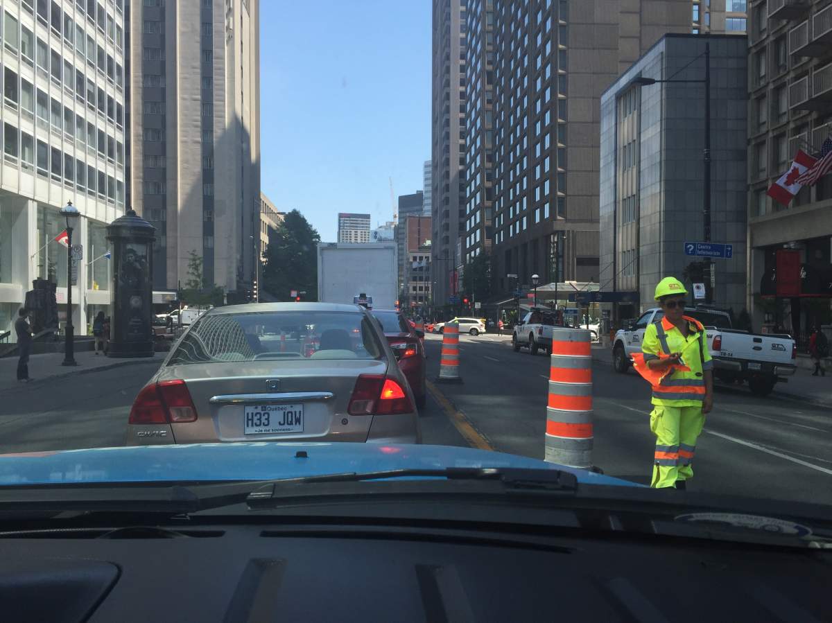 Traffic is reduced to one lane in either direction on Sherbrooke.