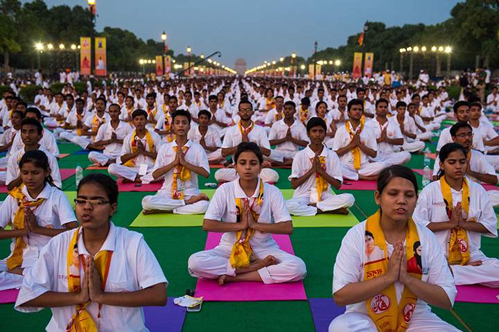 Indian yoga practitioners participate in a rehearsal for International Yoga Day on Rajpath in New Delhi on June 19, 2016.
