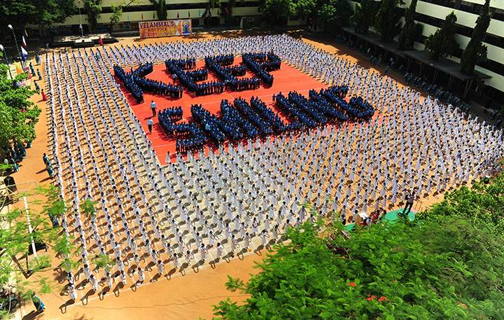 Schoolchildren participate in a yoga session at a school in Chennai, India on June 20, 2016, on the eve of International Yoga Day.