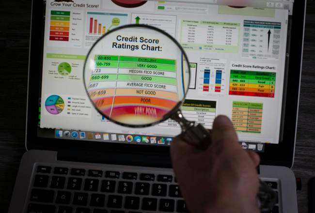 A photo illustration shows charts for credit scores on a computer in North Vancouver, B.C., Wednesday, June, 15, 2016.