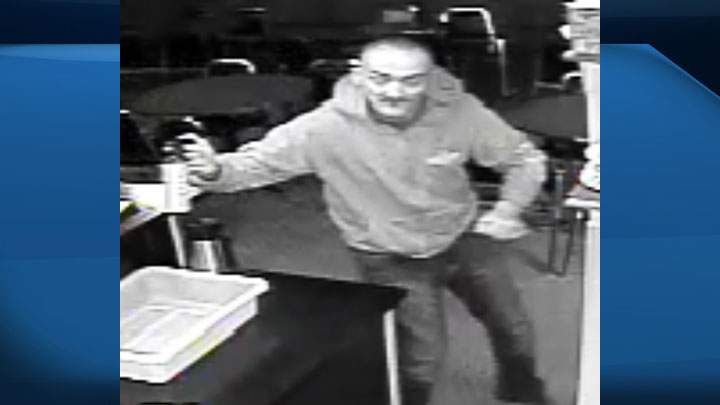 RCMP are looking for a suspect who fled in a vehicle with Saskatchewan licence plates after an armed robbery in Kitscoty, Alta. on Tuesday afternoon.