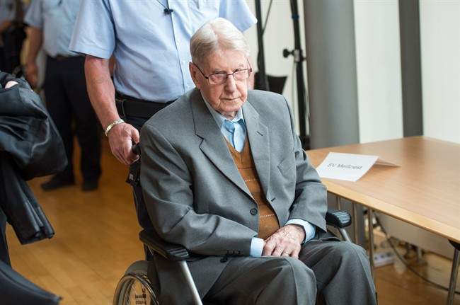 FILE- In this Saturday June 11, 2016 file photo, 94-year-old former SS guard at the Auschwitz death camp Reinhold Hanning, arrives at a courtroom in Detmold, Germany.