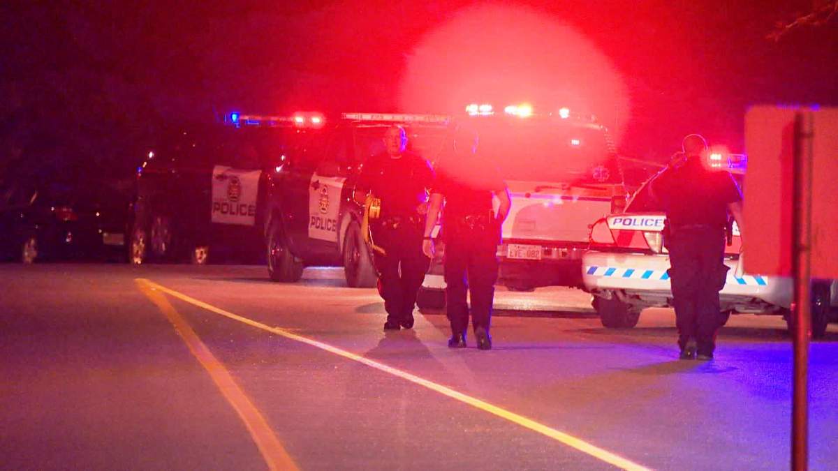 Calgary police investigate a violent home invasion in the 0-100 block of Beddington Drive N.E. on Sunday, June 26, 2016.