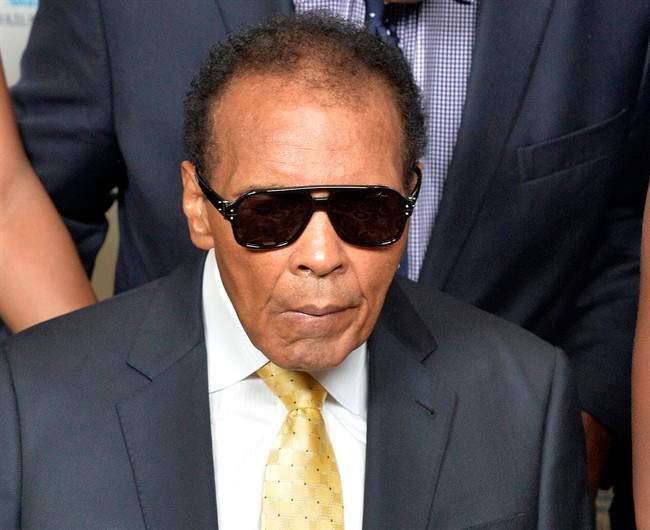  In this Sept. 27, 2014, file photo, Muhammad Ali is shown before the Ali Humanitarian Awards ceremony in Louisville, Ky.