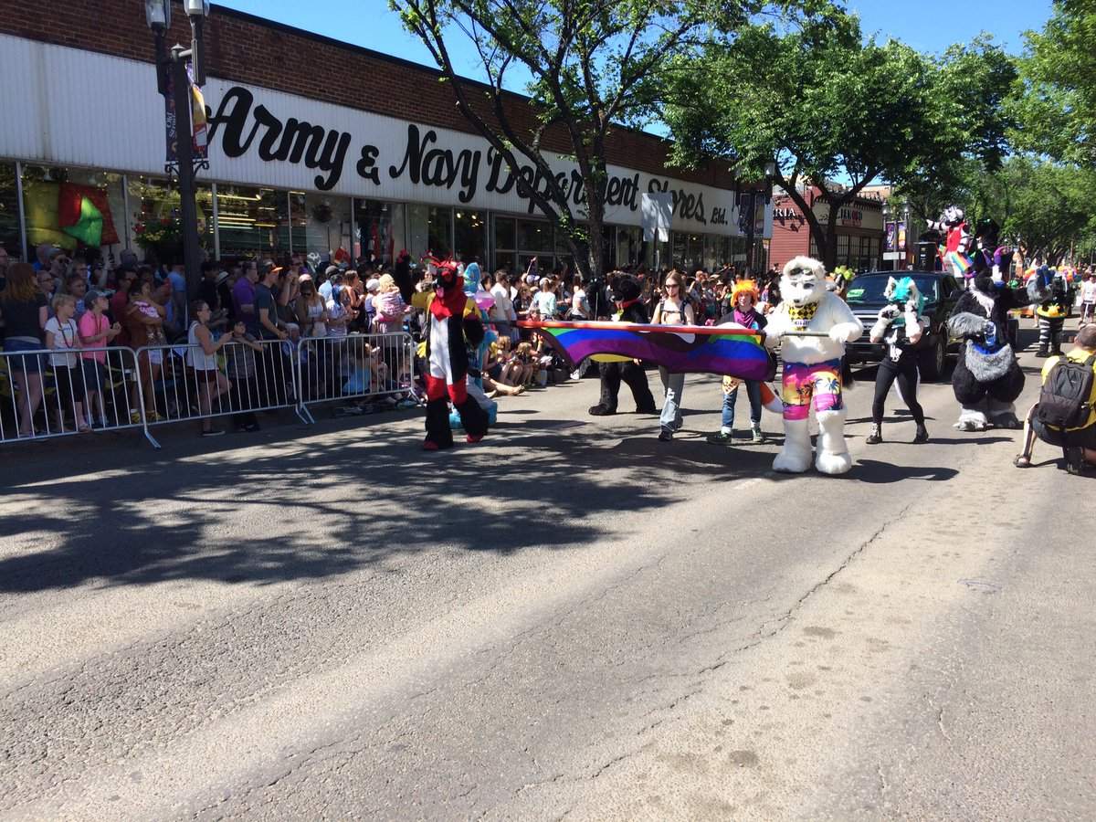 Edmontonians gather on Whyte Avenue to watch the Edmonton Pride Parade on June 4, 2016.
