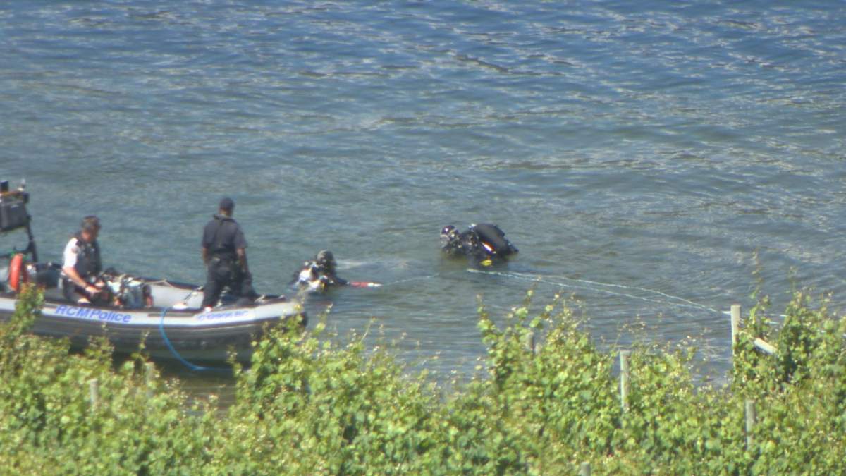 A RCMP dive team searches for a Lake Country woman who went missing following a canoe accident. 