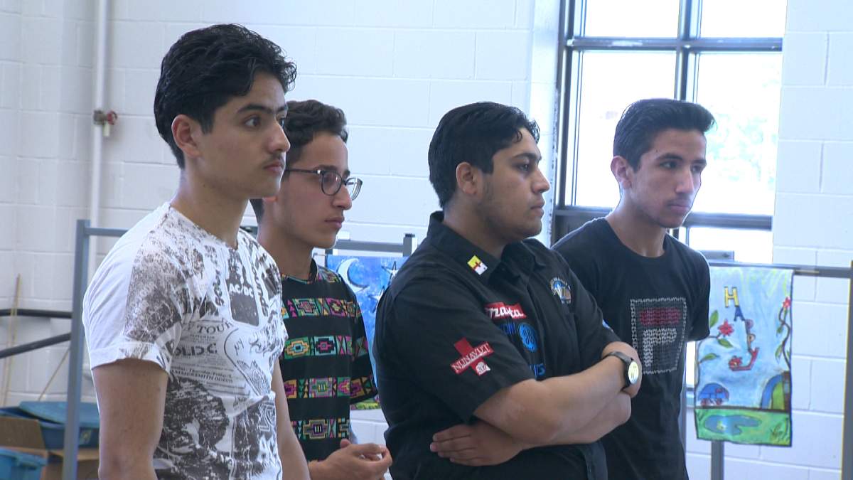 Syrian refugees take in World Refugee Day festivities in Fredericton.