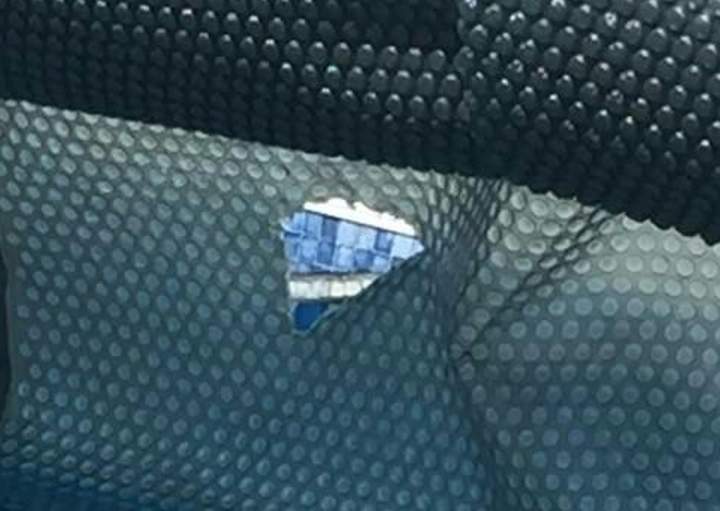 Torn pool cover