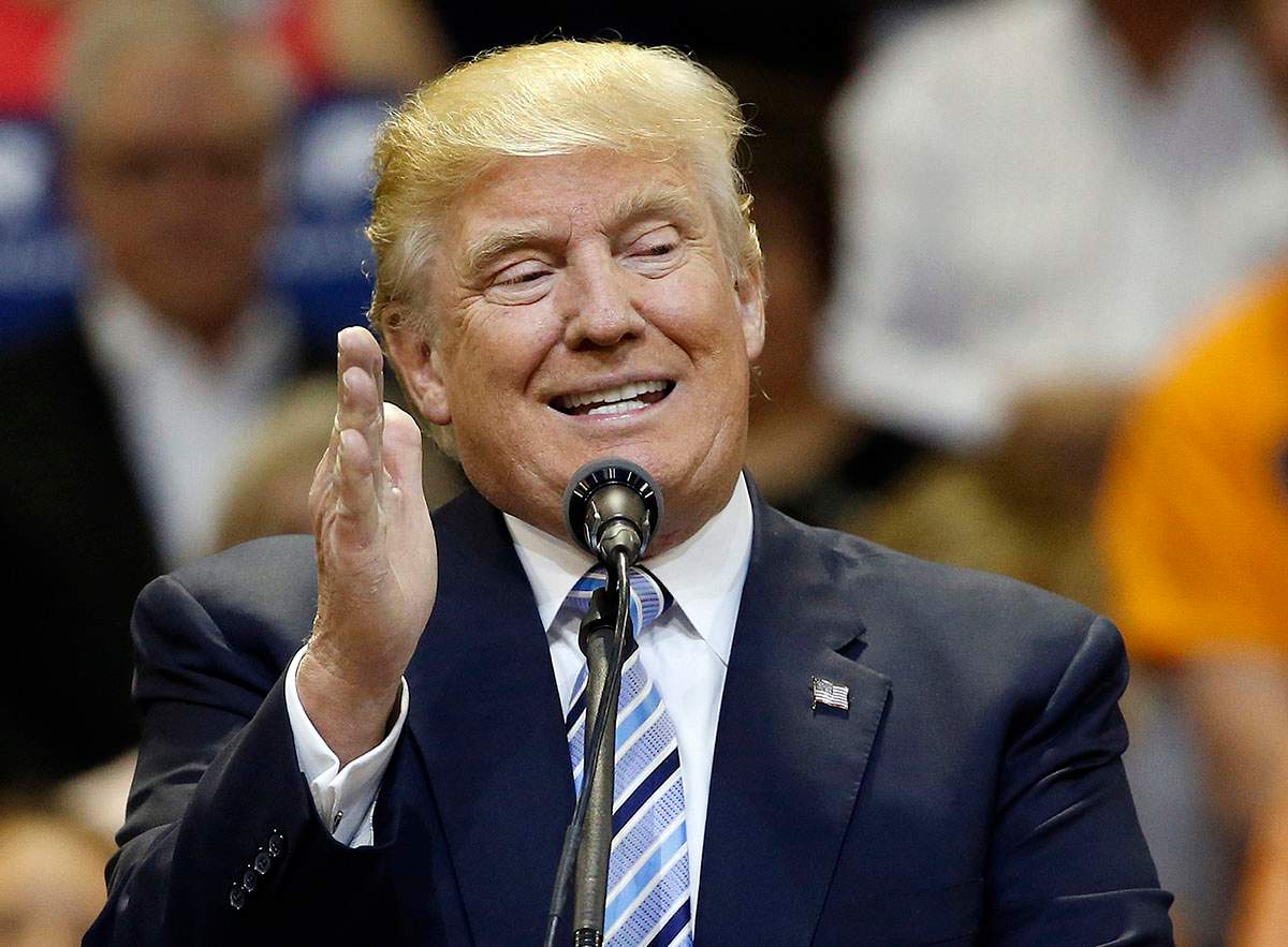 In this May 26, 2016, file photo, Republican presidential candidate Donald Trump speaks at a campaign rally at the Rimrock Auto Arena, in Billings, Mont. 