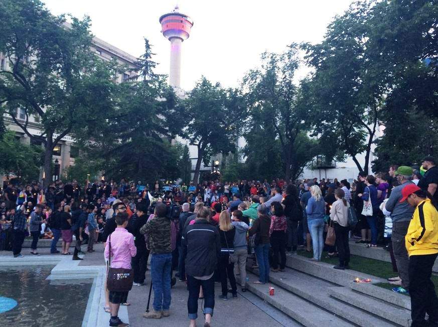 Organizers say about 400 people attend a vigil at Olympic Plaza on June 12, 2016 for victims of the Orlando shootings.