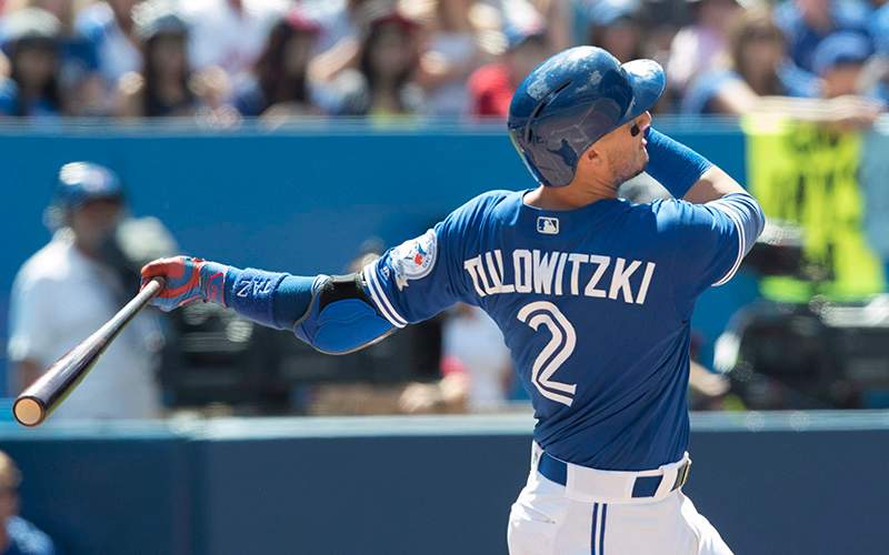 Toronto Blue Jays' Troy Tulowitzki hits a three-run home run against the Cleveland Indians during sixth inning American League MLB baseball action in Toronto on Sunday, July 3, 2016. 