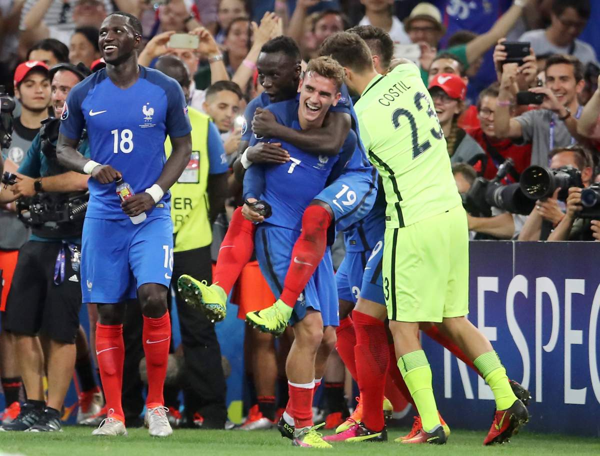 France players celebrate after wining the Euro 2016 semifinal soccer match between Germany and France, at the Velodrome stadium in Marseille, France, Thursday, July 7, 2016. 