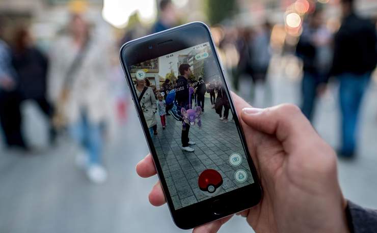 People gather for a Pokemon Go session in Hanover, Germany, 15 July 2016.