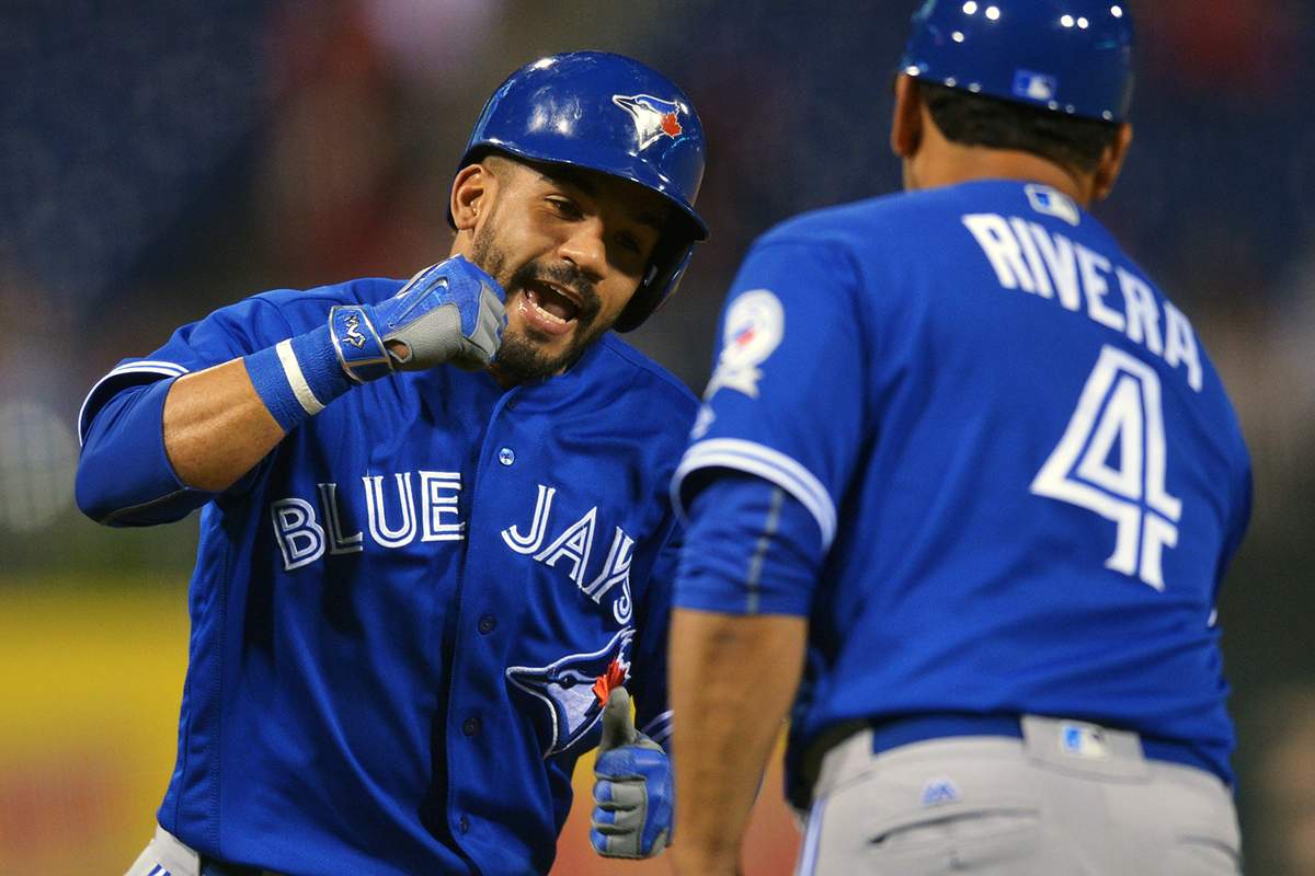 Devon Travis #29 of the Toronto Blue Jays hits a home run in the eighth inning against the Philadelphia Phillies after replacing an injured Jose Bautista #19 at Citizens Bank Park on June 16, 2016 in Philadelphia, Pennsylvania. 