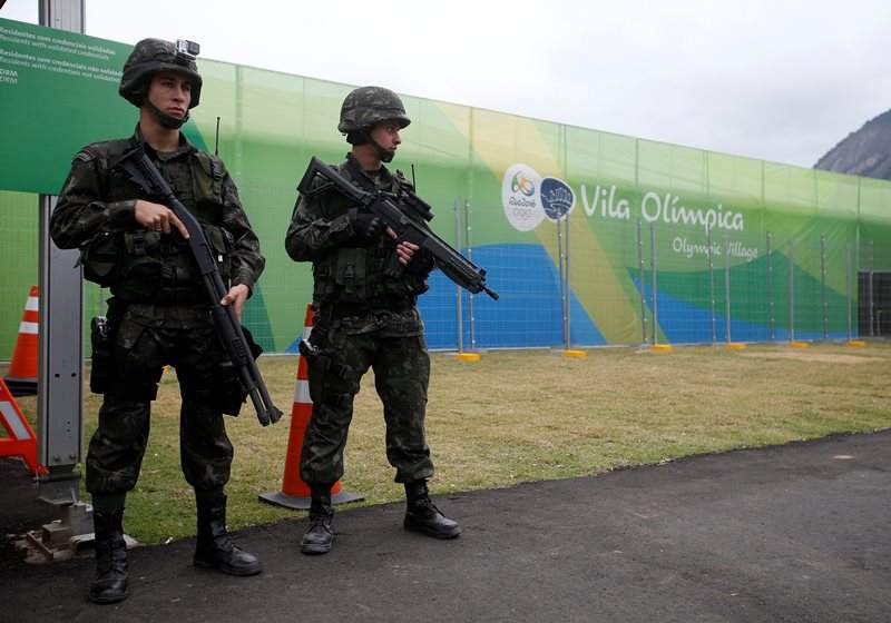 Soldiers of the Brazilian Armed Forces stand guard outside the 2016 Rio Olympics Village in Rio de Janeiro, Brazil, July 21, 2016.