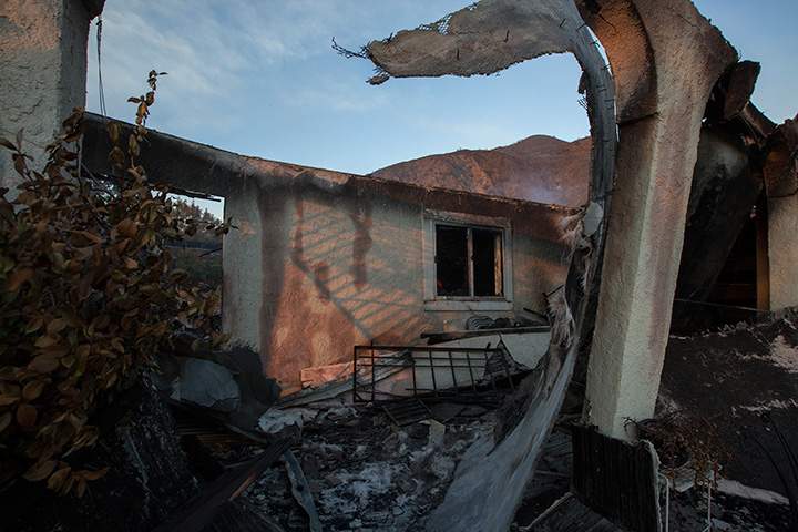 The ruins of a home destroyed by the Sand Fire are seen on July 25, 2016 in Santa Clarita, California.