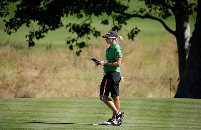 Alena Sharp, of Canada, looks over the first green during the third round of the U.S. Women\’s Open golf tournament at CordeValle Saturday, July 9, 2016, in San Martin, Calif.